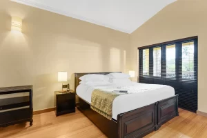 Spacious suite at a boutique hotel in Goa with elegant interiors and comfortable furnishings